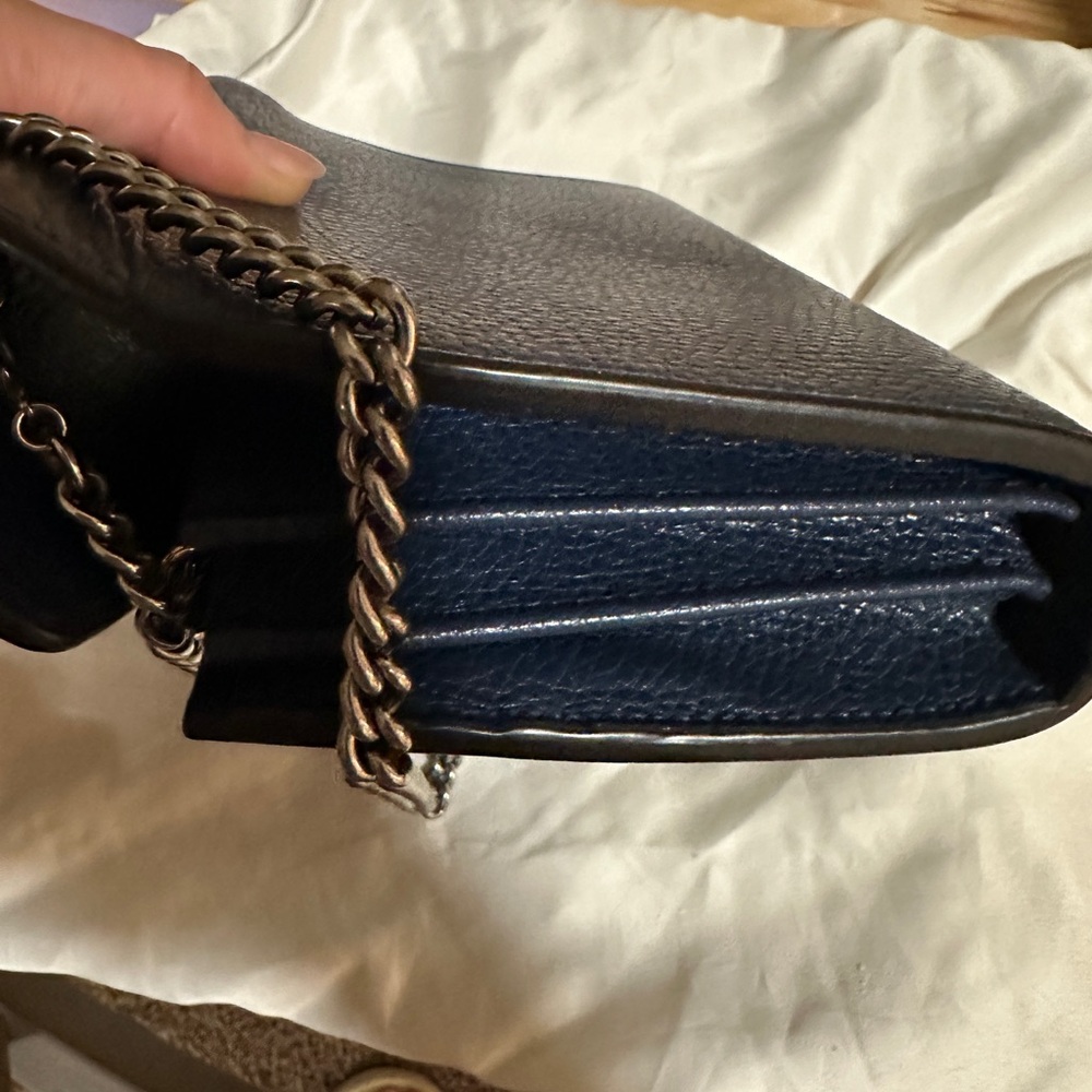 This is good condition 90% new tag .The color s dark blue